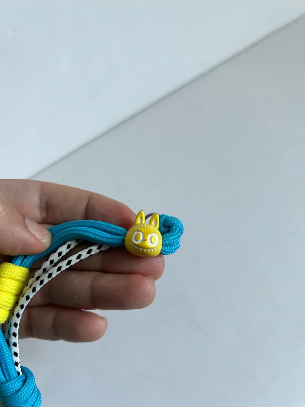THE MONSTERS 10TH ANNIVERSARY PHONE CHARM